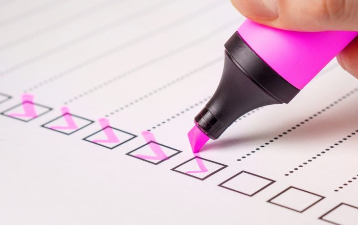 A photo of a highlighter making checklist to increase business productivity