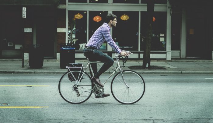 A photo of a person riding a bicycle